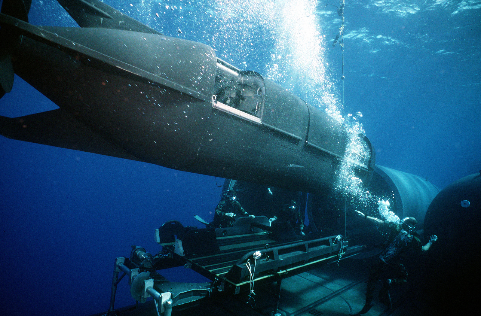 Ocean cross swell moves the special dive vehicle (SDV) to the side as ...