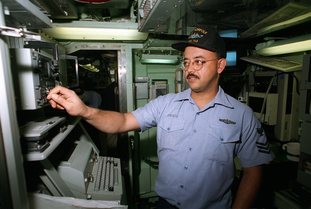 Electronics Technician First Class (et) Edwin Gonzalez Stands The 