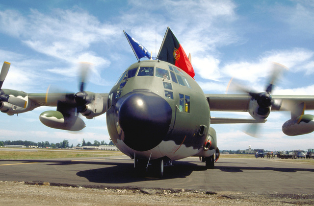 Competitors conduct a static line jump from a C-130 - PICRYL