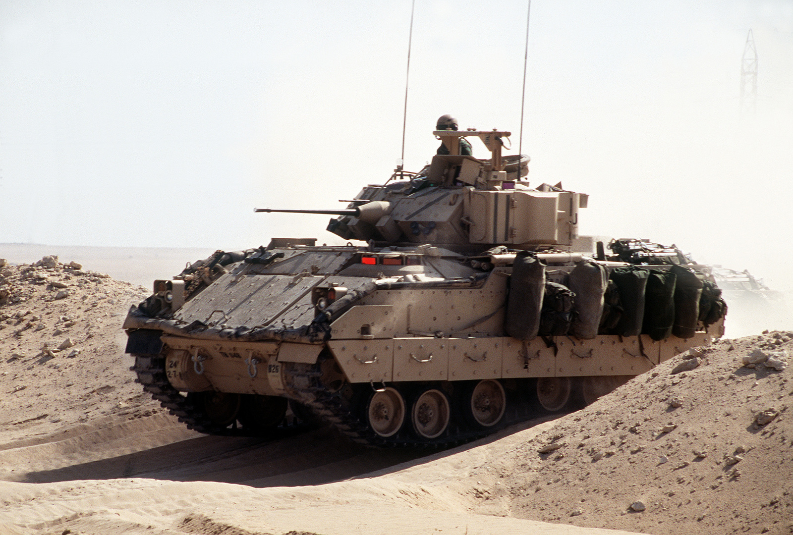 A M2A2 Bradley Fighting Vehicle engaging in the Mounted Patrol out of ...