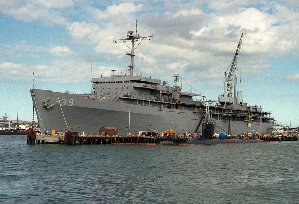 US Navy Engineman 2nd Class Anthony Bartelli (right) holds an