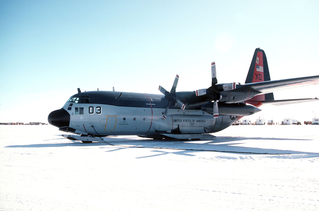 Left front view of a ski equipped C-130T Hercules aircraft of ...