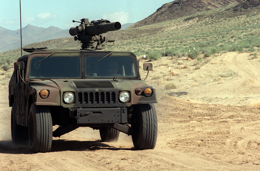 A front view of a U.S. Army M998 High-Mobility Multipurpose Wheeled Vehicle  (HMMWV) equipped with an M220A1 tube-launched, optically-tracked,  wire-guided (TOW) missile launcher during testing - PICRYL - Public Domain  Media Search