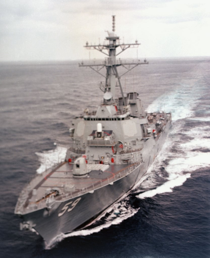 An aerial port bow view of the guided missile destroyer USS Russell ...