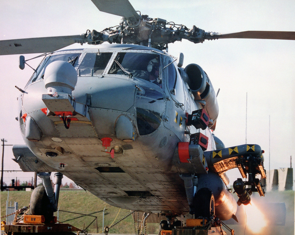 https://cdn10.picryl.com/photo/1995/03/01/a-hellfire-missile-ignites-in-preparation-for-launching-from-an-sh-60f-seahawk-b2e061-1024.jpg