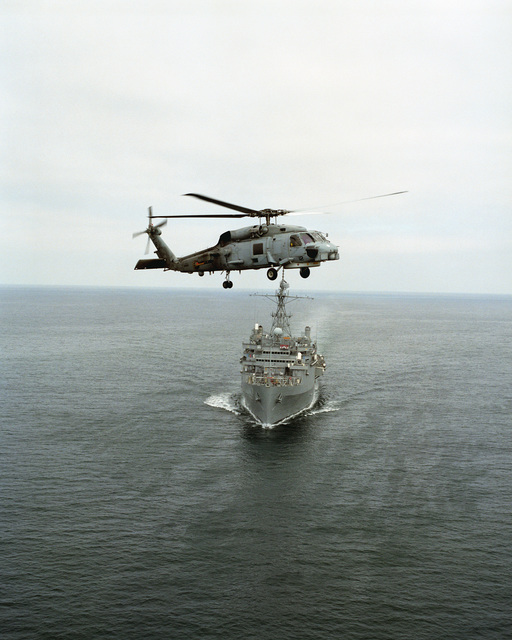 446th AW passes Seahawks' 12th-Man flag to Coast Guard > 446th