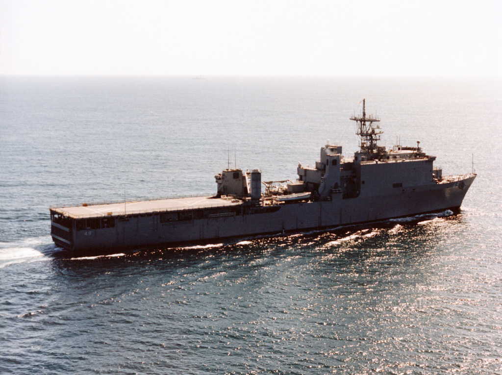 Aerial starboard side view of the dock landing ship USS HARPERS FERRY ...