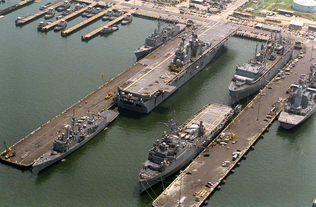 An aerial view of a section of the Naval Station showing piers 7 and 8 ...