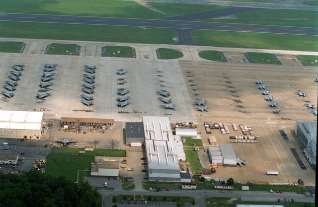 An aerial view of part of the flight line at NAS Oceana showing F-14 ...