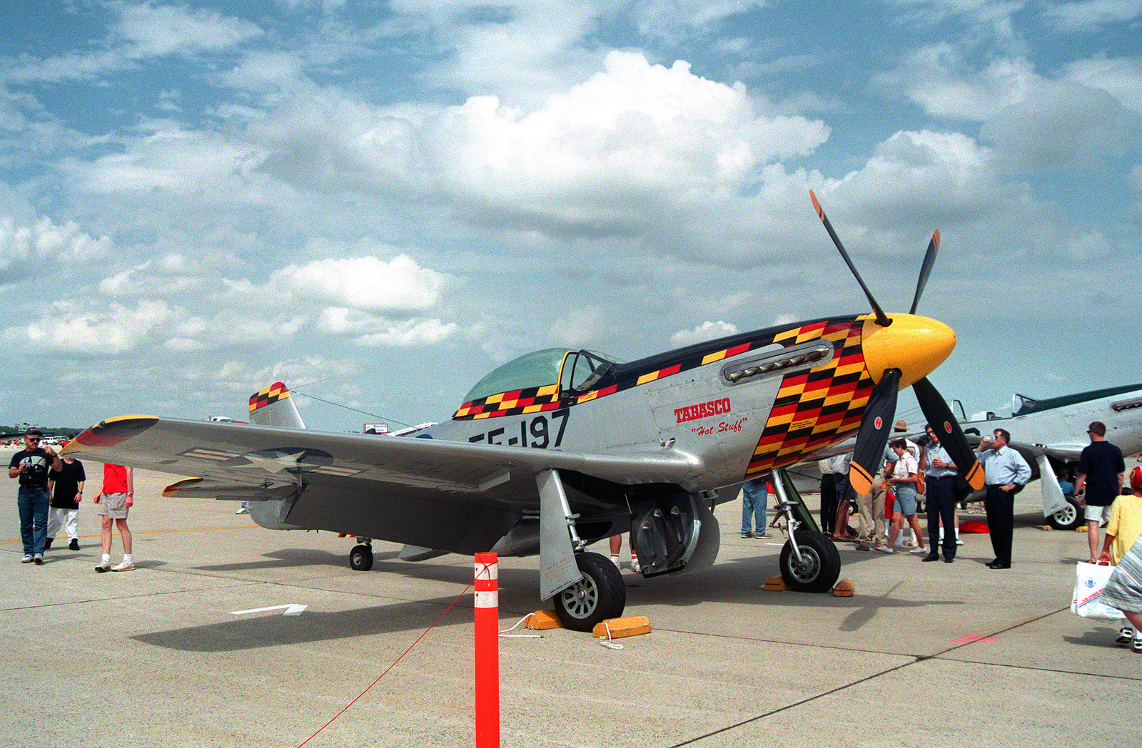 A right front view of a P-51D Mustang fighter aircraft named Tabasco ...