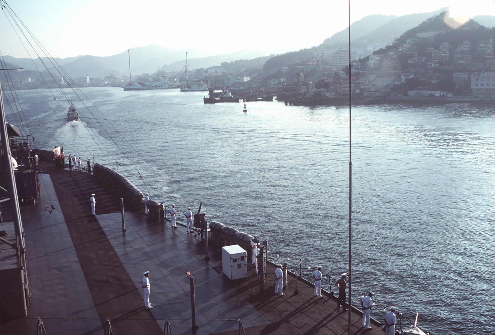 A view off the starboard bow of the amphibious command ship USS BLUE ...