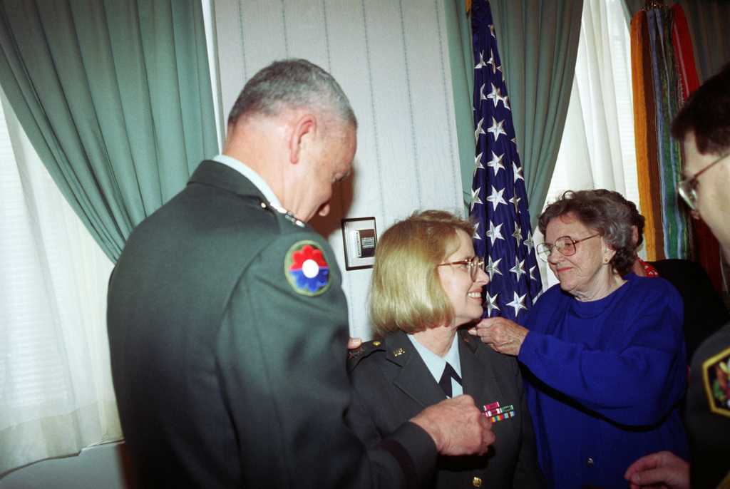 President Truman presents Gen. Dwight Eisenhower with the third