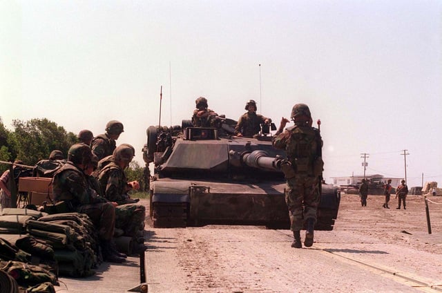 An M1A1 Main Battle Tank from 2d Tank Battalion crosses the ...