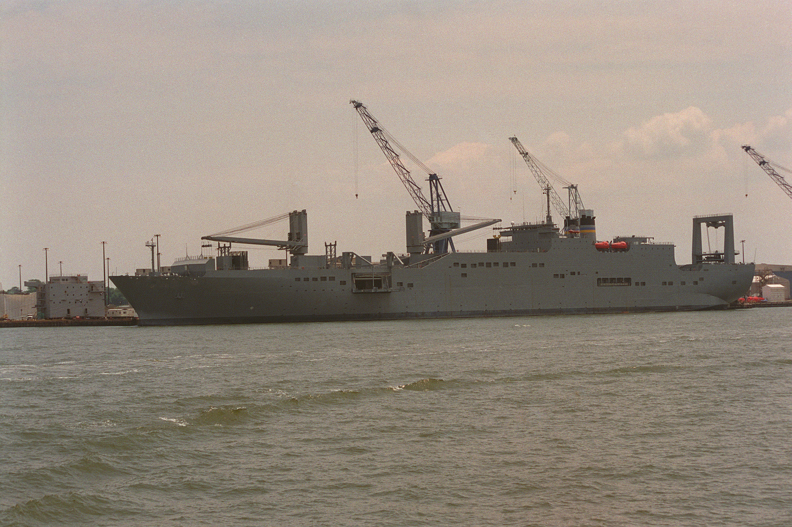 A port side view of the Military Sealift Command vehicle transport ship ...