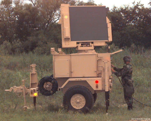 During a simulated tactical scenario, SPC Bryan A. Cook of HHB 1ST of ...