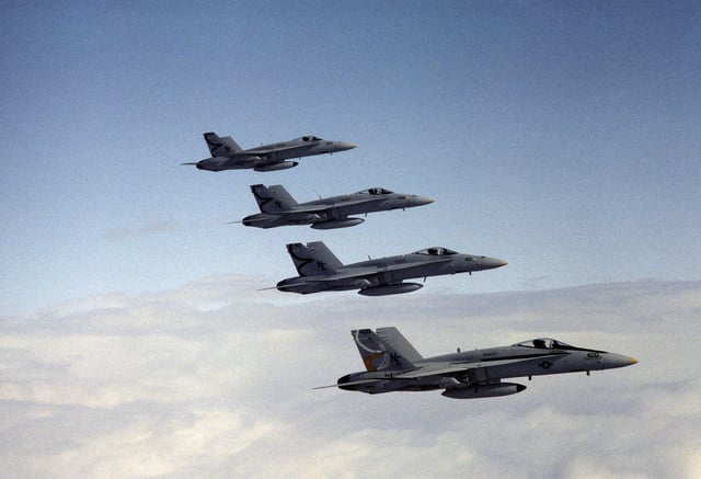 Starboard aerial of four F/A-18C Hornets from the Strike Fighter ...