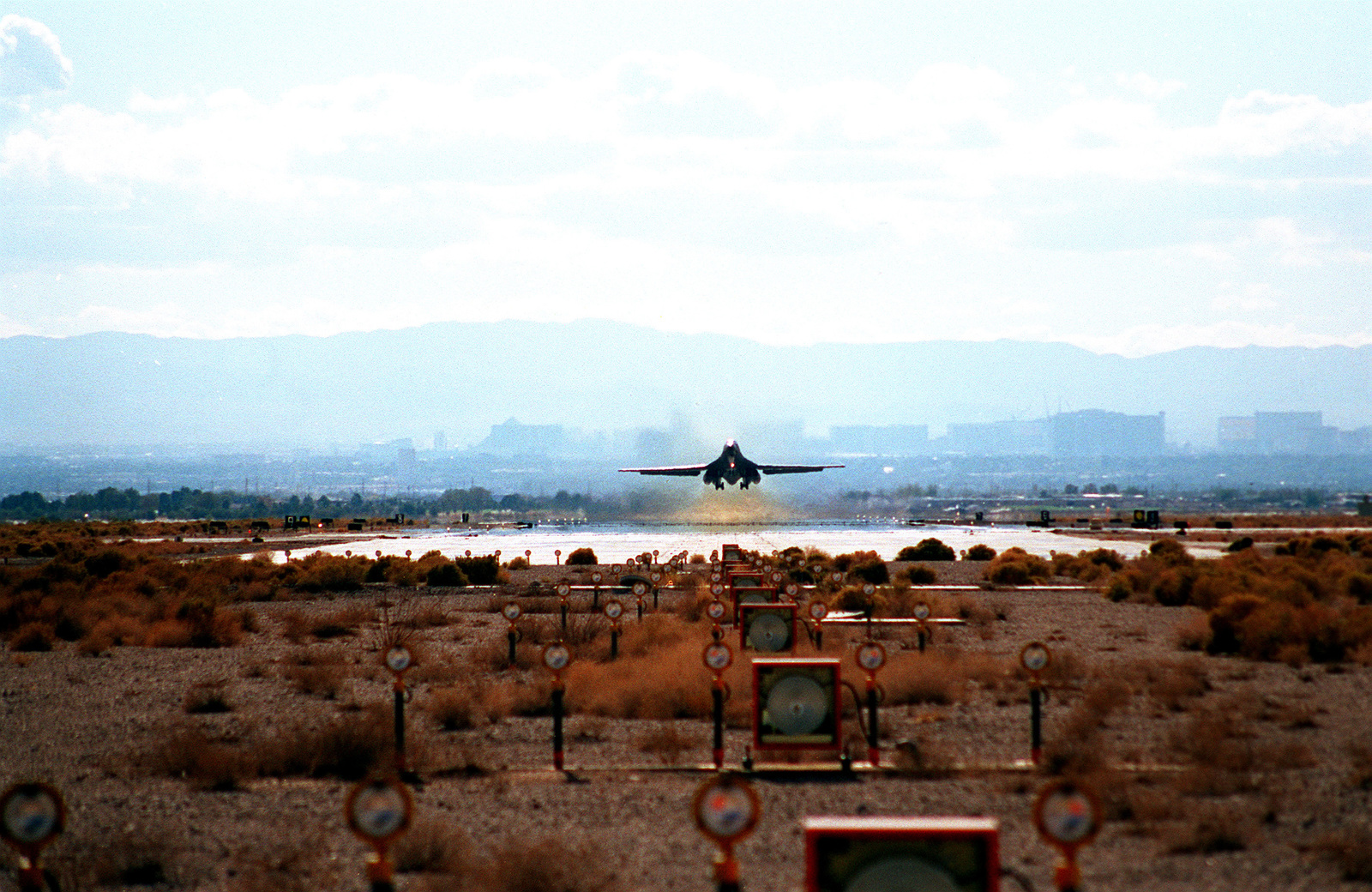 A Long-range Front View Of A 7th Wing B-1B Lancer As It Takes Off ...