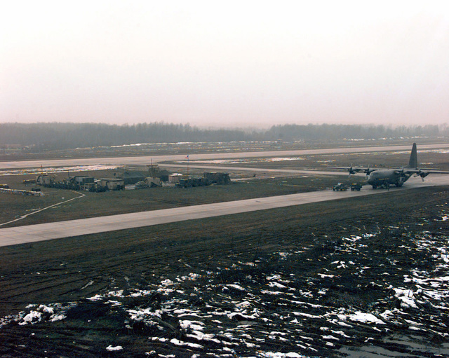 A view of the flightline, taxiway and air traffic control facilities ...