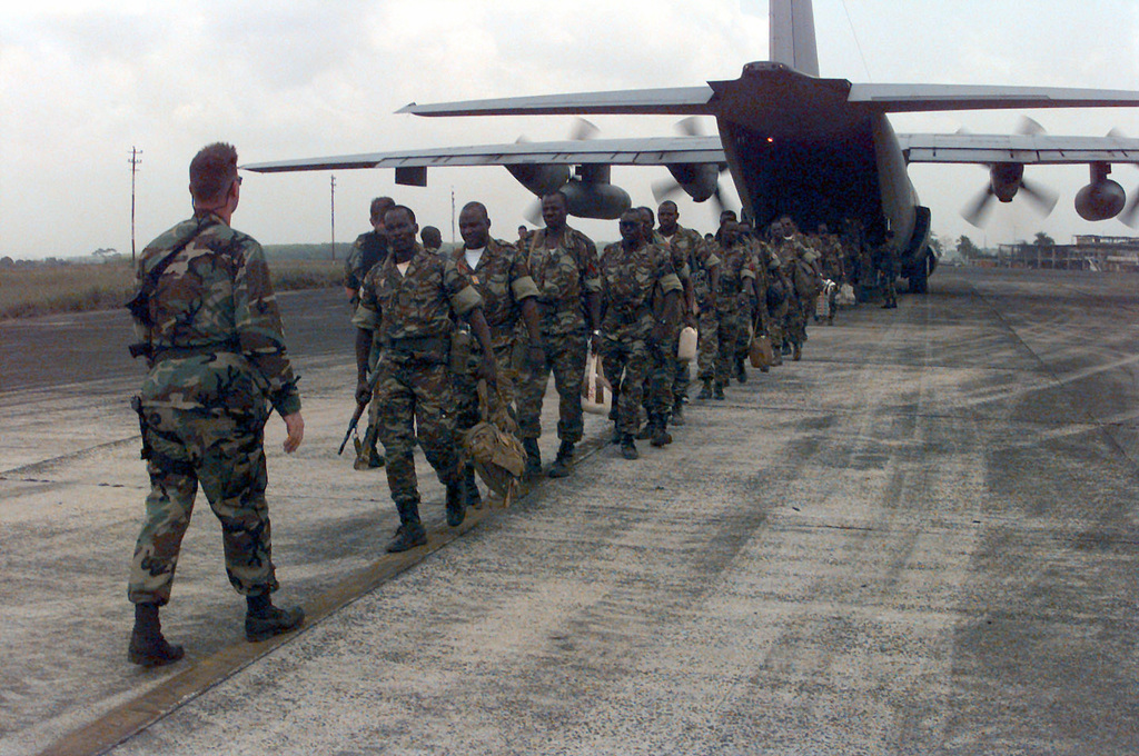 Economic Community Military Observation Group (ECOMOG) Mali Army Troops  come off a United States Air Force