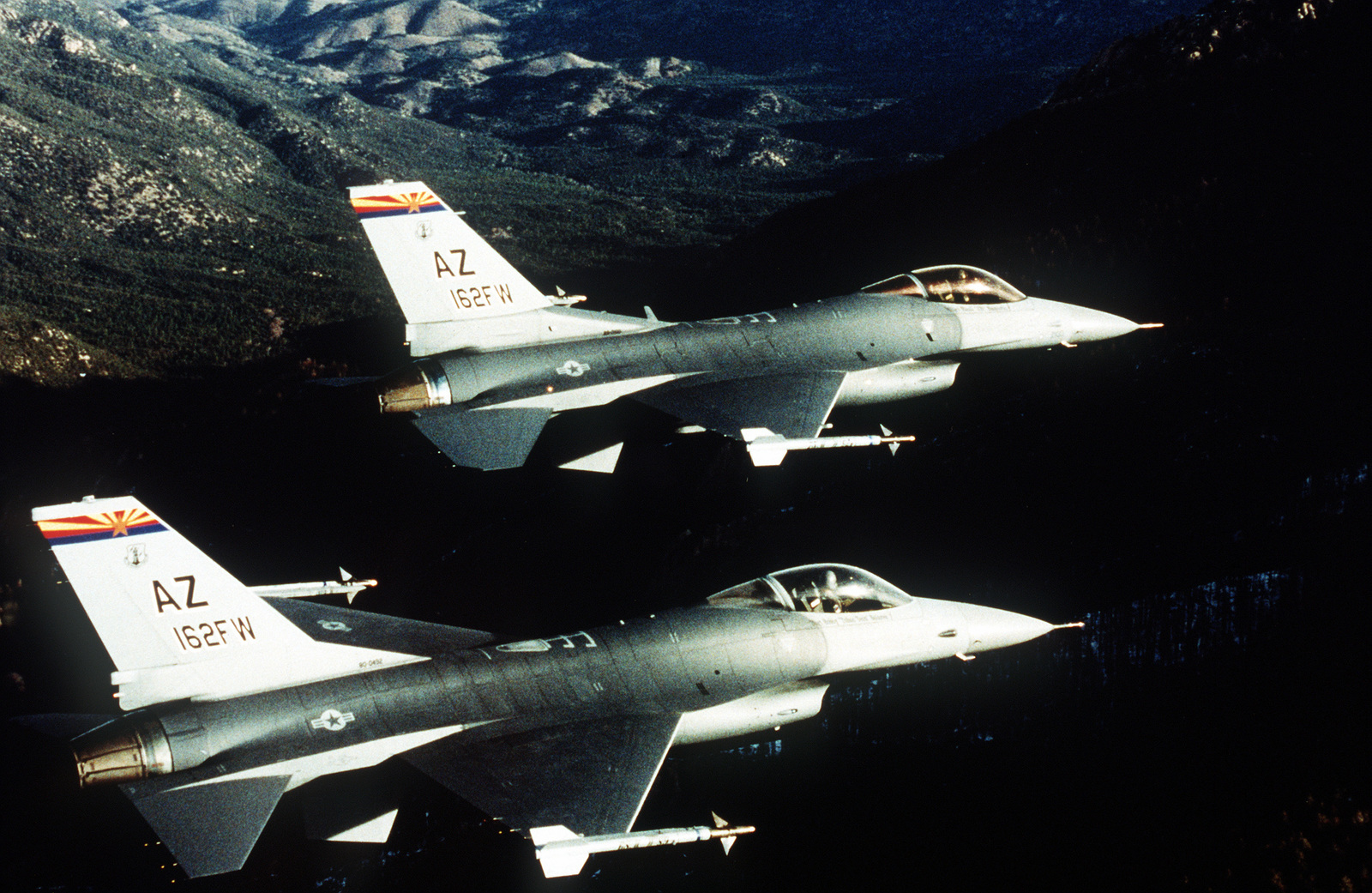 Aerial photo of F-16s over Mount Lemon, Arizona. Planes are from the ...