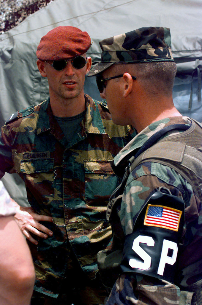 US Air Force MASTER Sergeant (MSGT) Vernon D. Blocker talks with a ...