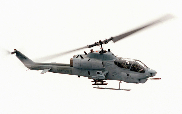 A Marine Corps AH-1W Super Cobra from Marine Light Attack Helicopter ...