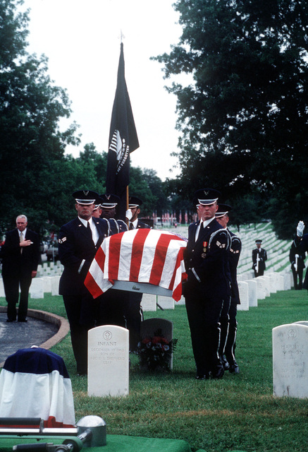 United States Air Force Color Guard carry the remains of USAF First ...