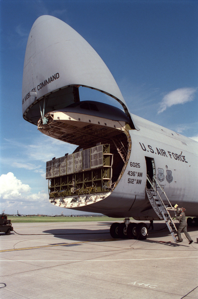 A C-5B Galaxy from 436th Airlift Wing, Dover, Delaware, sits with 