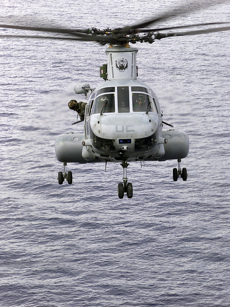 A USMC CH-46E (Sea Knight) helicopter from Marine Helicopter Squadron  Medium (HMM 262), come in for a landing on the flight deck of the USS Essex  (LHD 2). Marines from the 31st