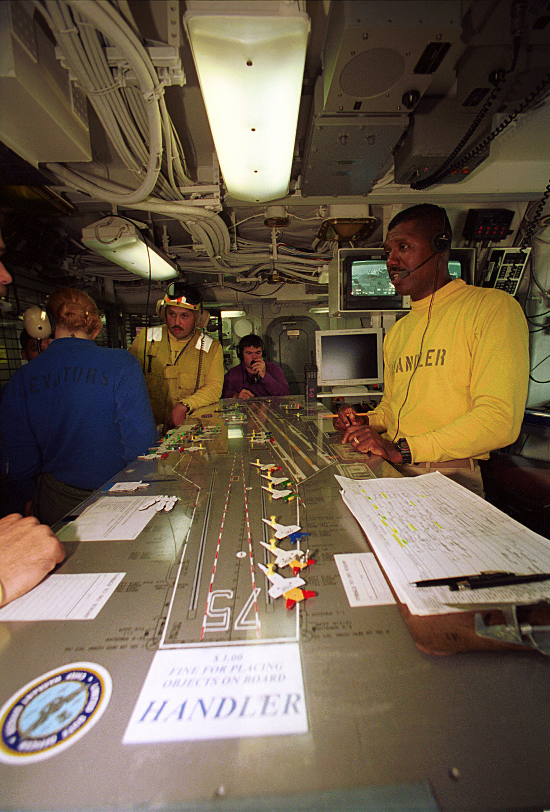 US Navy Lieutenant Commander R.D. Jones discusses flight operations ...