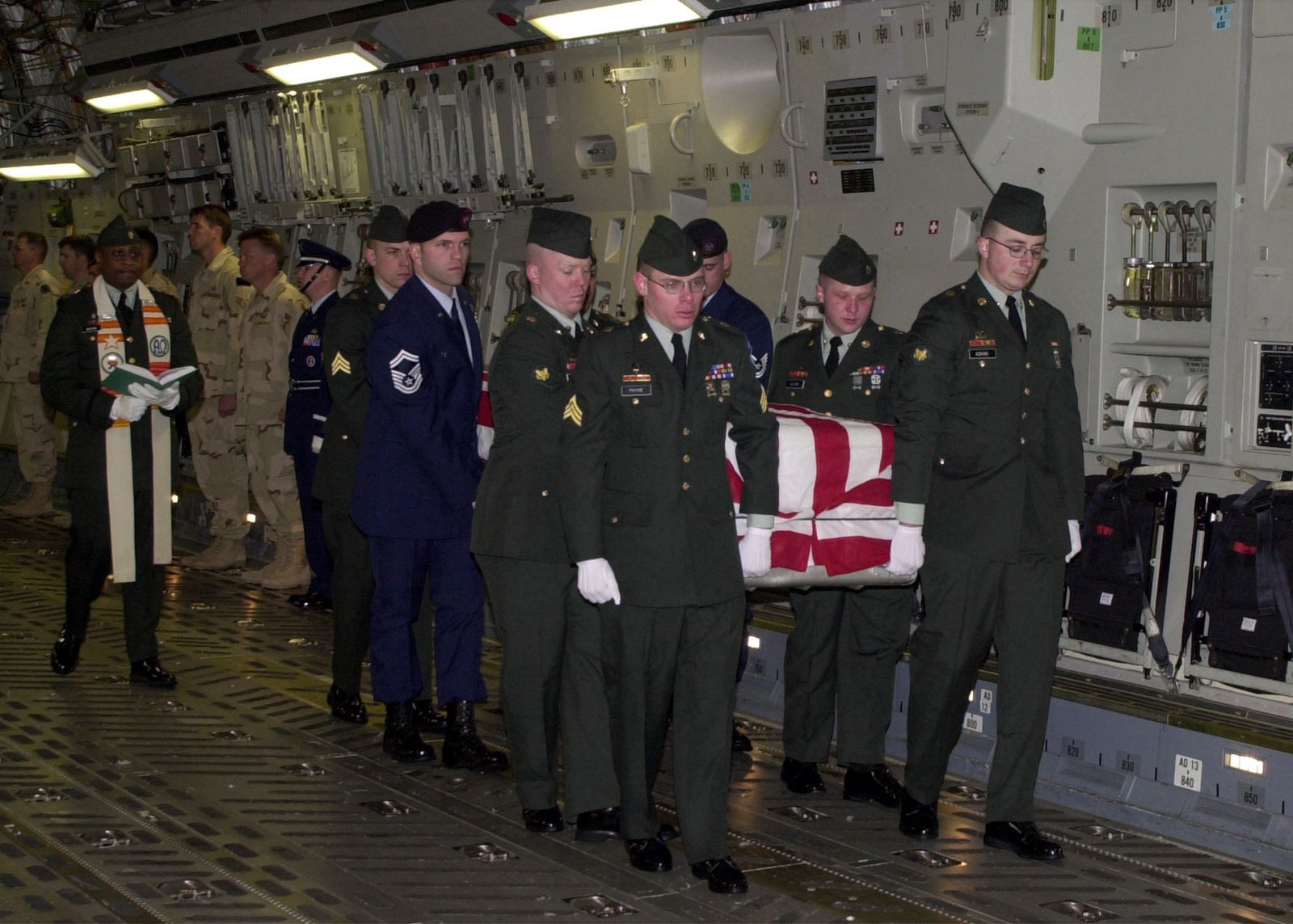 A US Army Chaplain Follows A Joint Service Honor Guard Of US Army ...