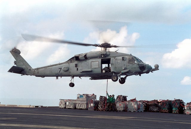 storekeepers-hook-up-stores-aboard-the-uss-kitty-hawk-cv-63-to-an-sh-60b-lamps-87c16c-640.jpg