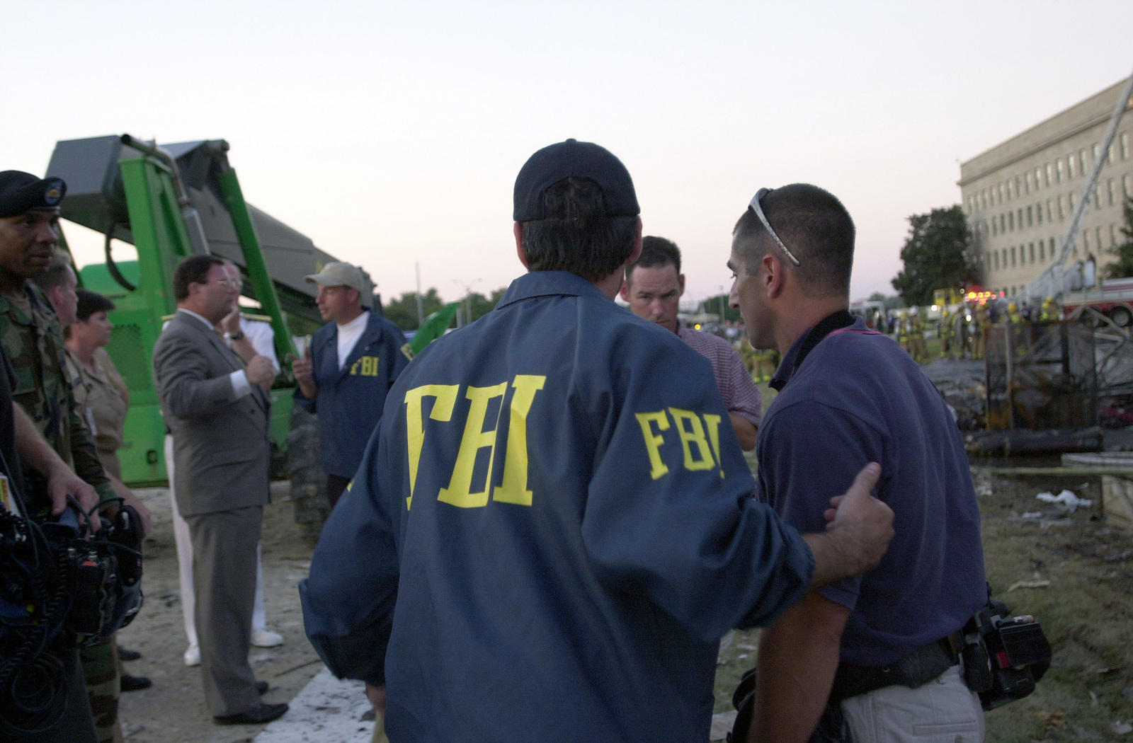 Members Of The Federal Bureau Of Investigation (FBI) Meet Outside The ...