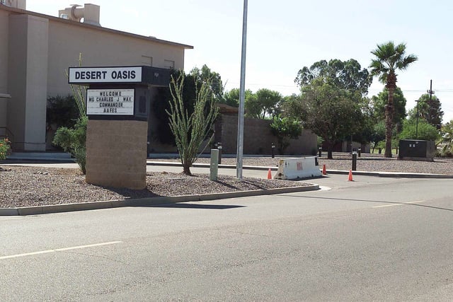 The entrance to the Desert Oasis Enlisted Club is block from vehicles ...