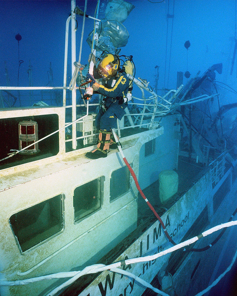 A US Navy diver assigned to Mobile Diving and Salvage Unit One