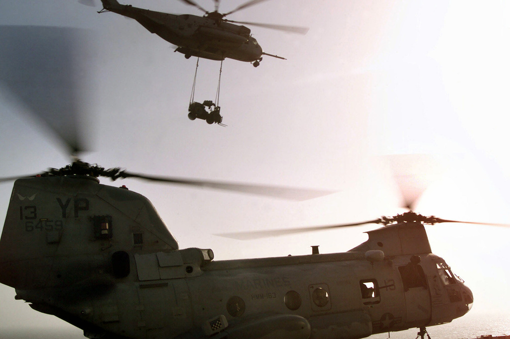 CH-46E Helicopter departs flight deck - NARA & DVIDS Public Domain