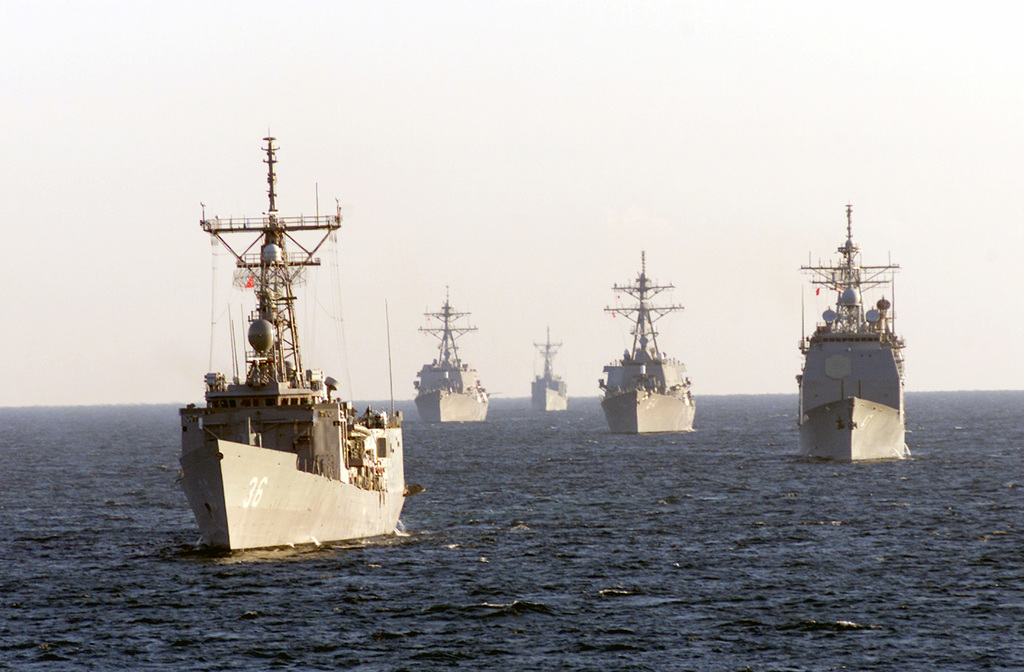 An armada of US Navy USN ships underway in