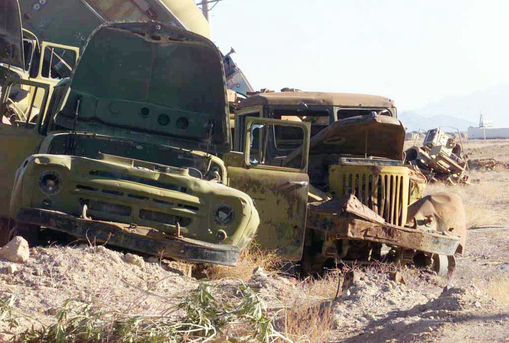 Soviet Derelick Vehicles Zil 130 Left And A Maz 0 Near Fighting Positions Manned By Marines