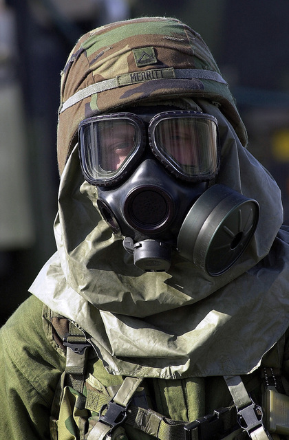 A US Army (USA) Soldier assigned to the 95th Chemical Company waits to ...