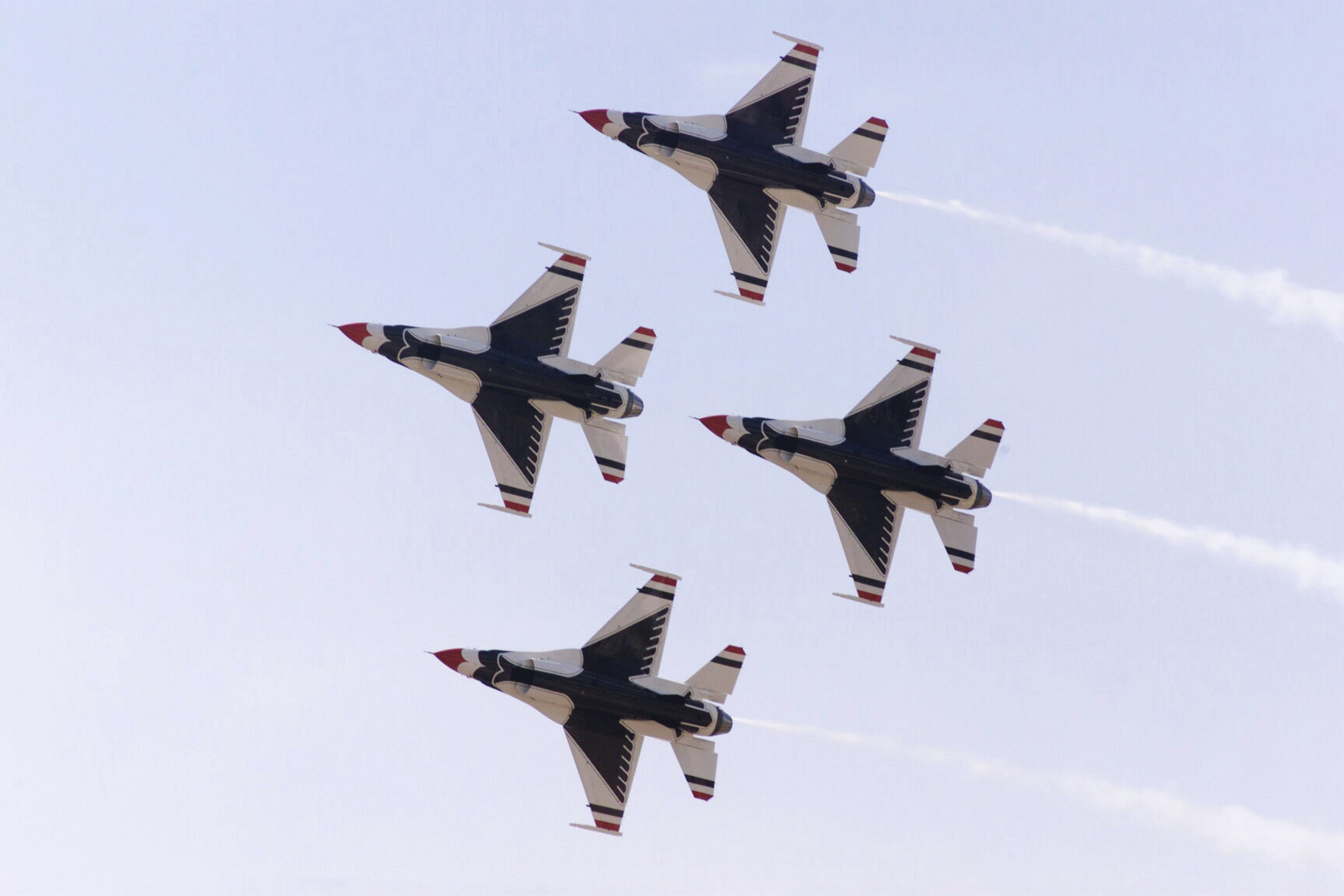 A four ship formation of F-16 Fighting Falcon aircraft from the US Air ...