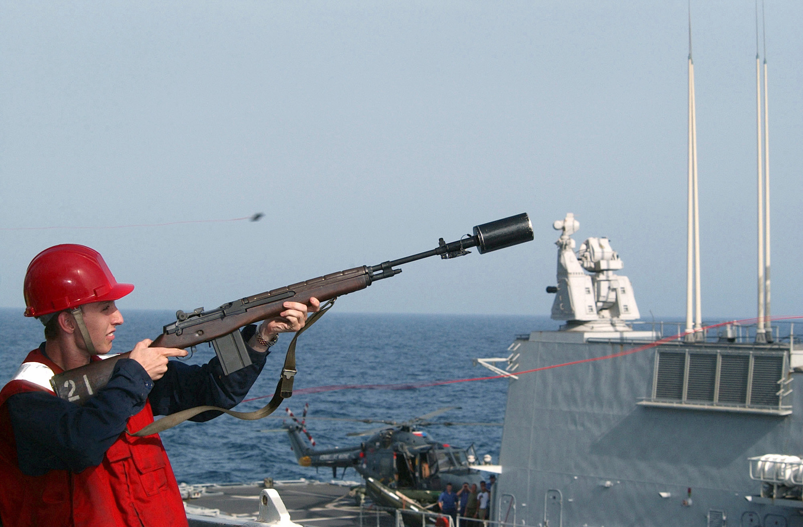 An American Sailor Fires A Shot Line With A 7 62mm M14 Rifle To The Royal