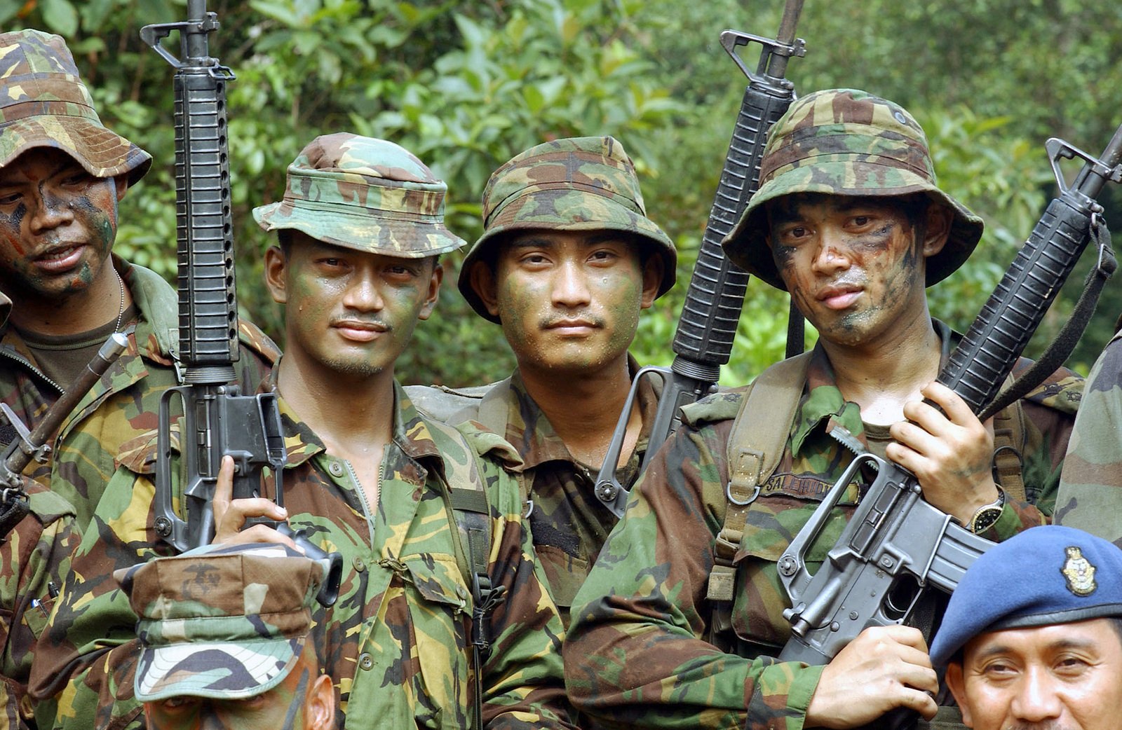 In The Jungles Of Brunei Darussalam, Royal Brunei Army Members Pose For ...