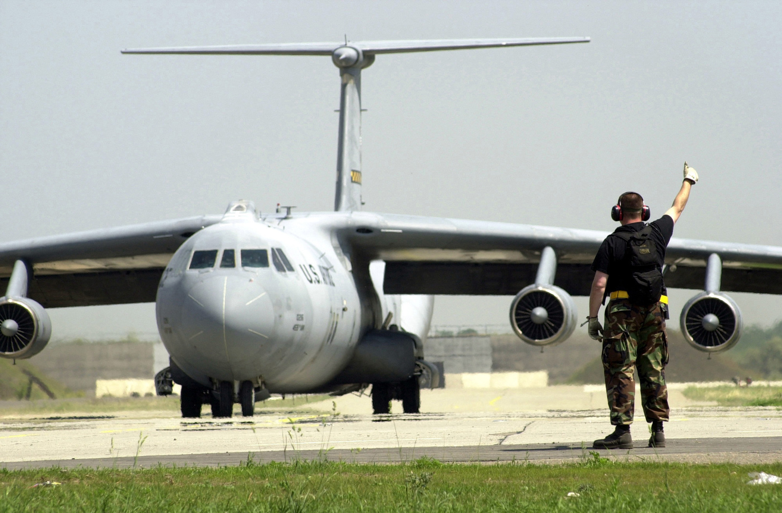 A US Air Force (USAF) Air Force Reserve Command (AFRC) C-141B ...