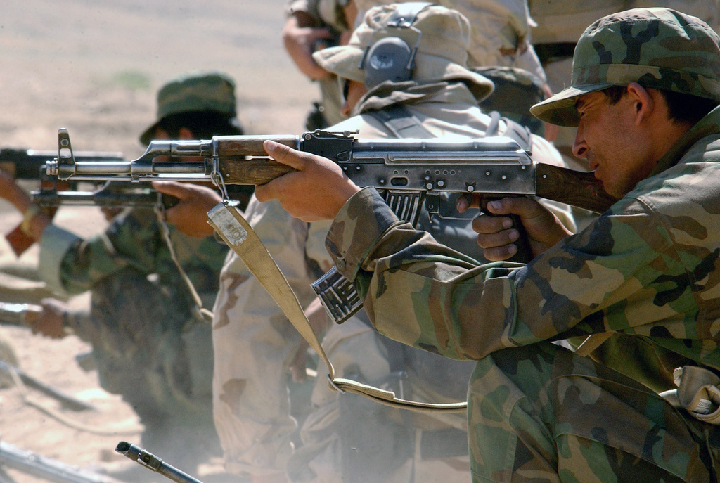 New recruits in the Afghanistan National Army (ANA) fire their