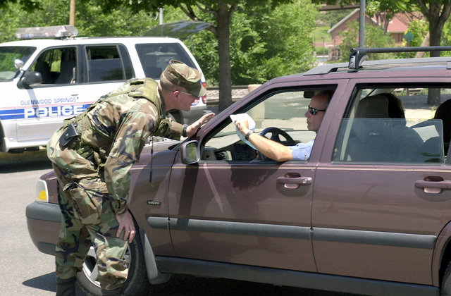 A Driver Gives A Member Of The 220th Military Police (MP) Company ...