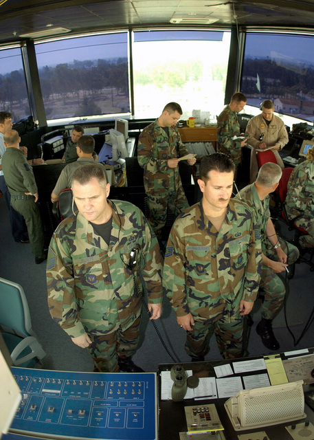 US Air Force (USAF) MASTER Sergeant (MSGT) Robert Elliott (foreground ...