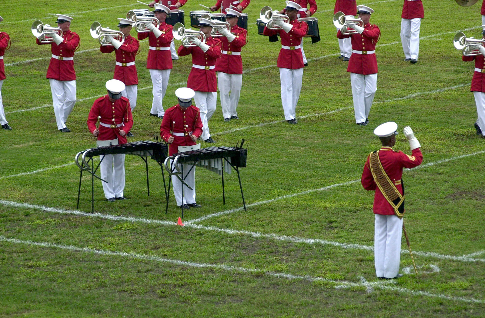 The US Marine Corps (USMC) Drum and Bugle Corps performed various songs