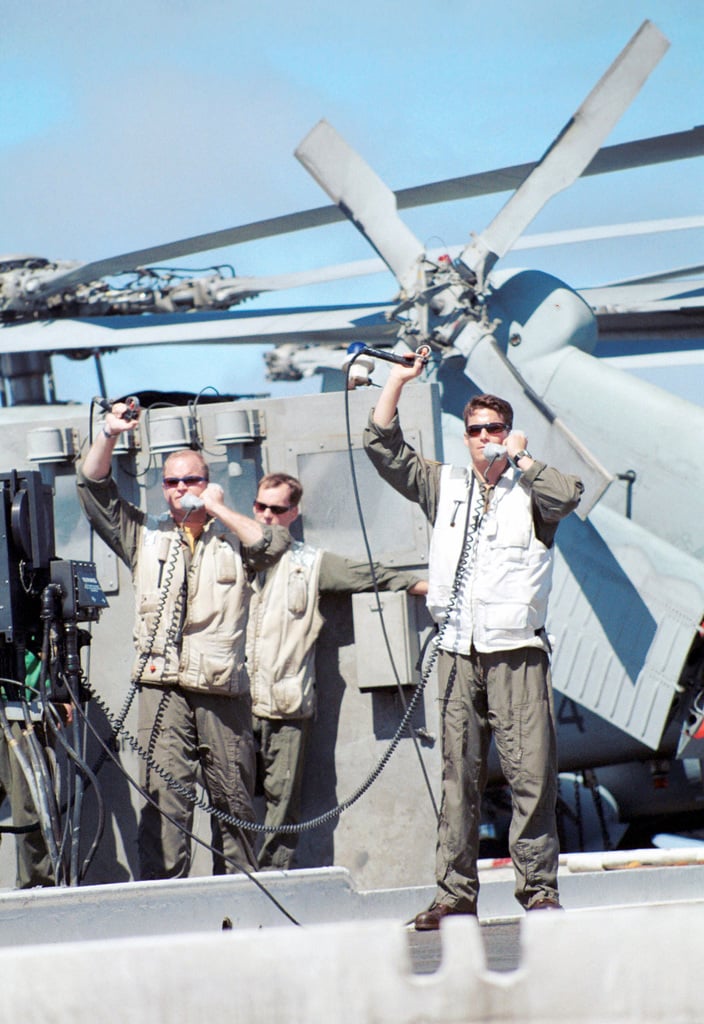 US Navy (USN) Landing Signal Officers (LSO) maintain ...