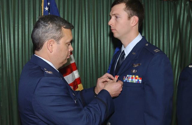 US Air Force (USAF) Colonel (COL) Michael A Longoria (left), Commander ...