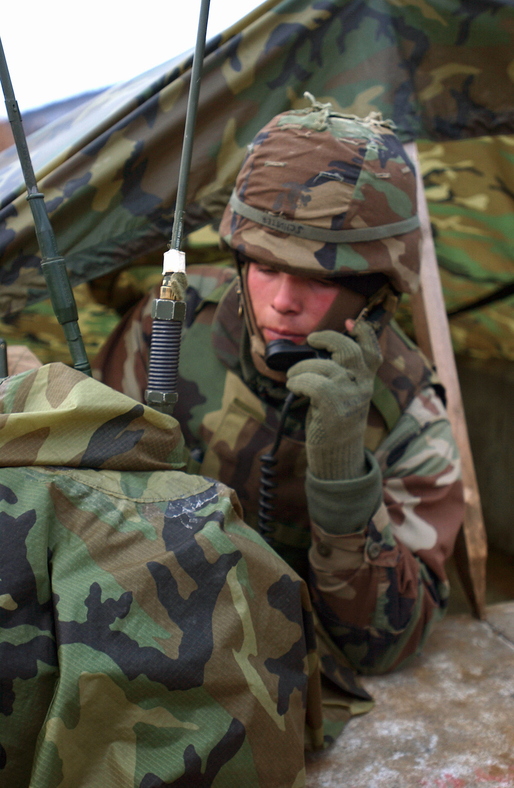 US Marine Corps (USMC) Lance Corporal (LCPL) Michael Schutt, a Radio  Operator with Sierra Battery, 5th Battalion, 10th Marine Regiment, sets up  Communication with Regiment Headquarters on the East Fuji Maneuver Area (